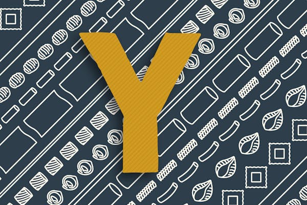 Buchstabe Y in gelb auf dunklem Hintergrund